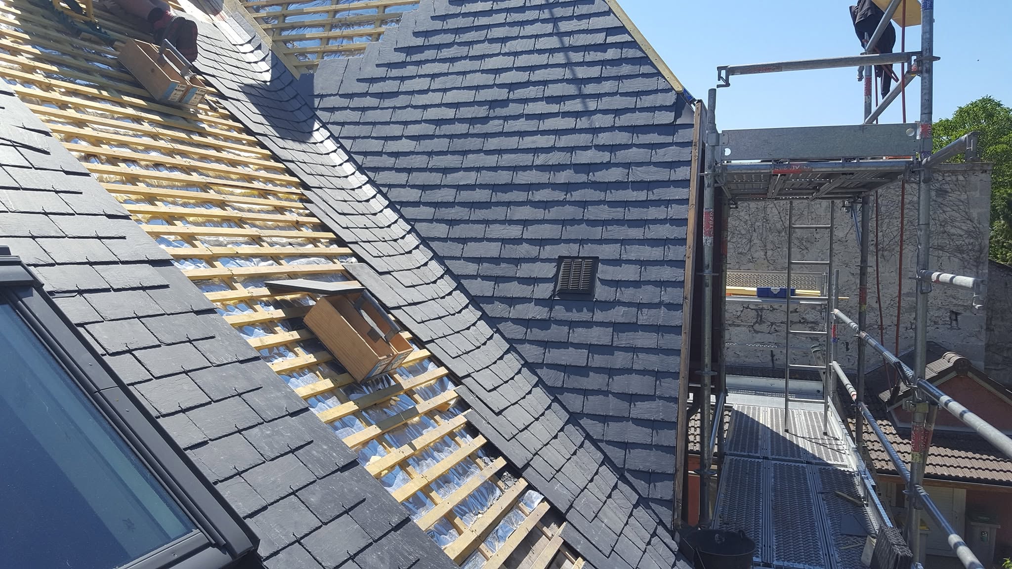 Avancement d’une toiture en ardoises